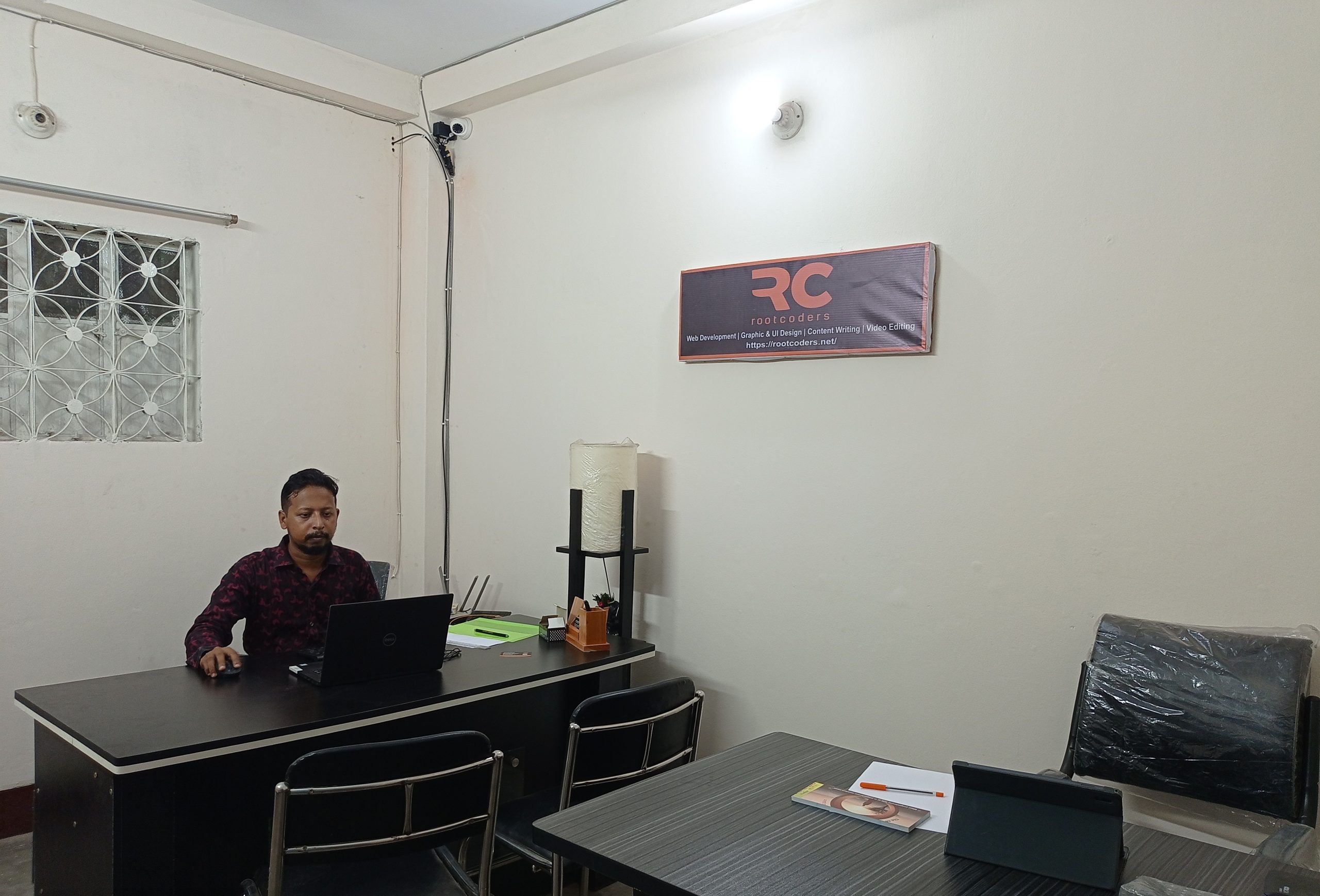 root coders founder office image